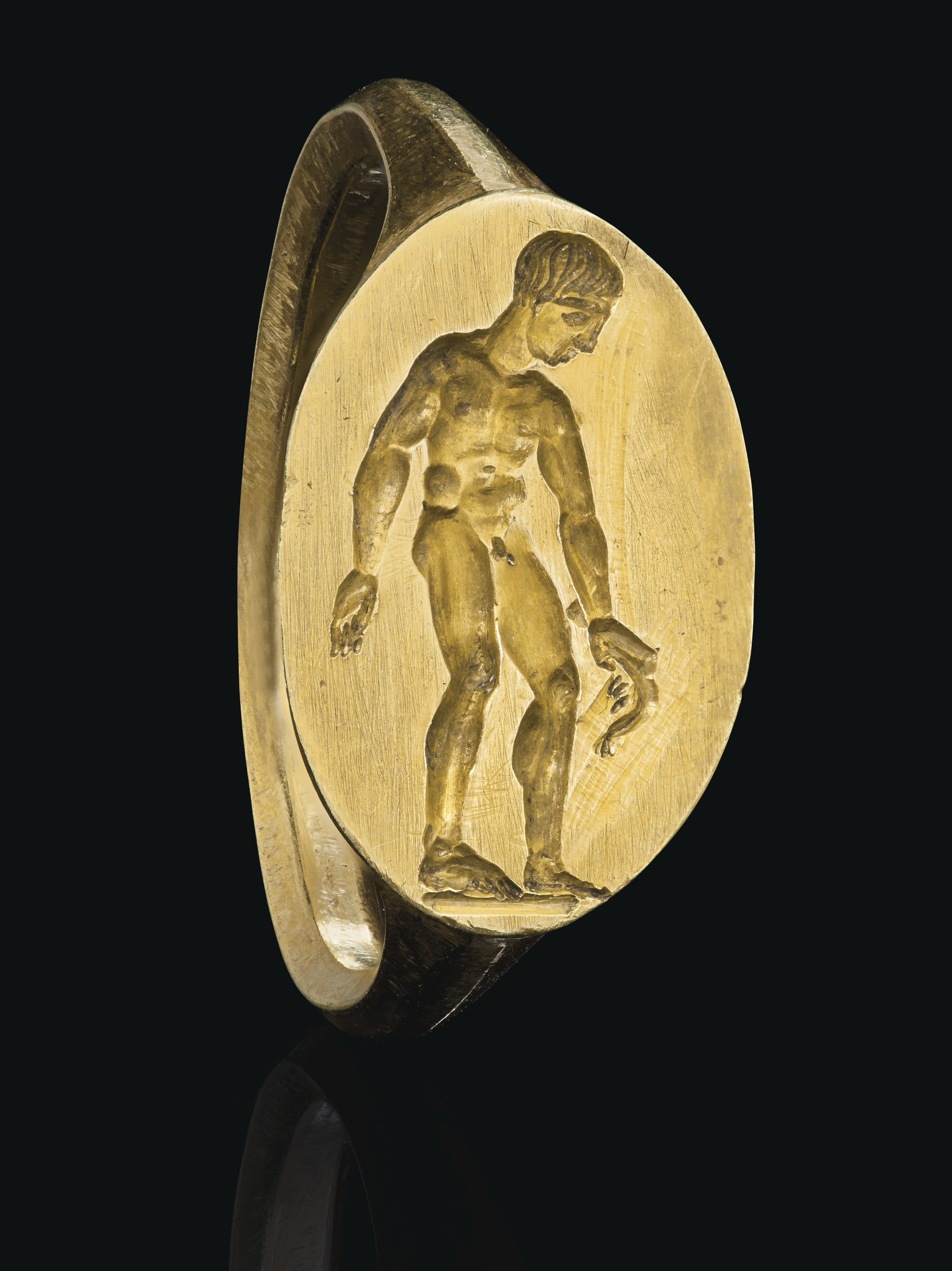 A Greek gold finger ring with an athlete, Hellenistic period, circa late 4th century B.C., sold for $15,000 on 16 June 2020 at Christie's Online